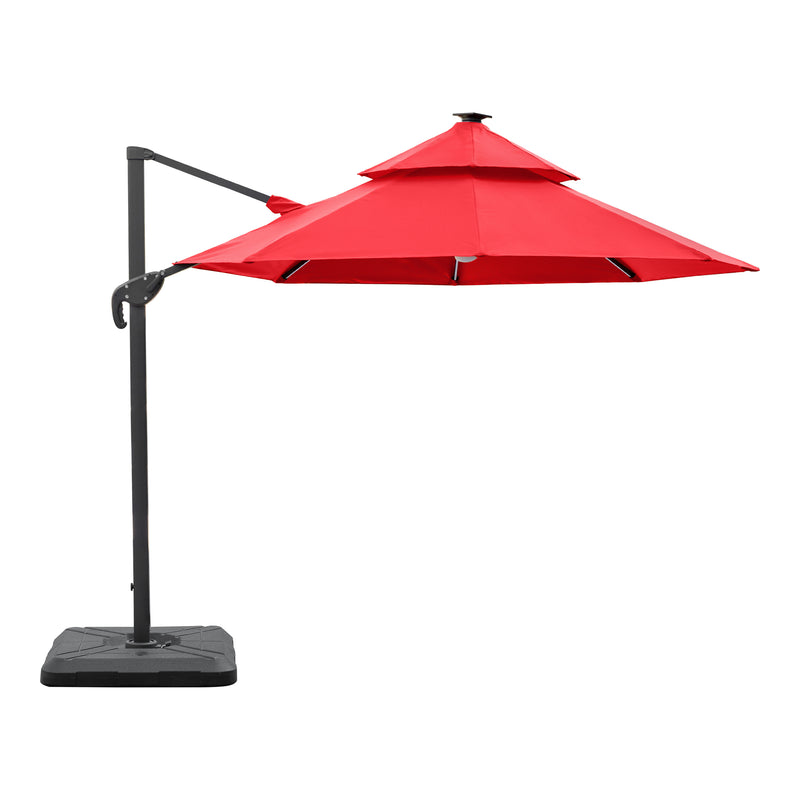 Front facing side view of a contemporary cantilever umbrella in red fabric with solar LED lighting and carrying case on a white background