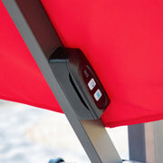 Close up of the control panel on a contemporary umbrella in red fabric with solar LED lighting (base not included)