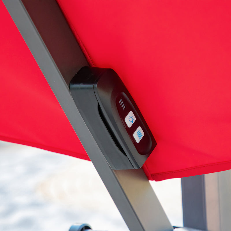 Close up of the control panel on a contemporary umbrella in red fabric with solar LED lighting (base not included)