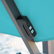 Close up of the control panel on a contemporary cantilever umbrella in teal fabric with solar LED lighting and carrying case