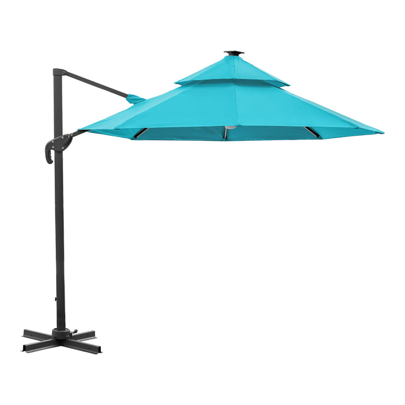 Front facing side view of a contemporary umbrella in teal fabric with solar LED lighting (base not included) on a white background