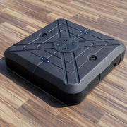 Right facing contemporary high-density polyethylene fillable square umbrella base on a patio
