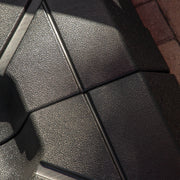Close up of a contemporary high-density polyethylene fillable square umbrella base