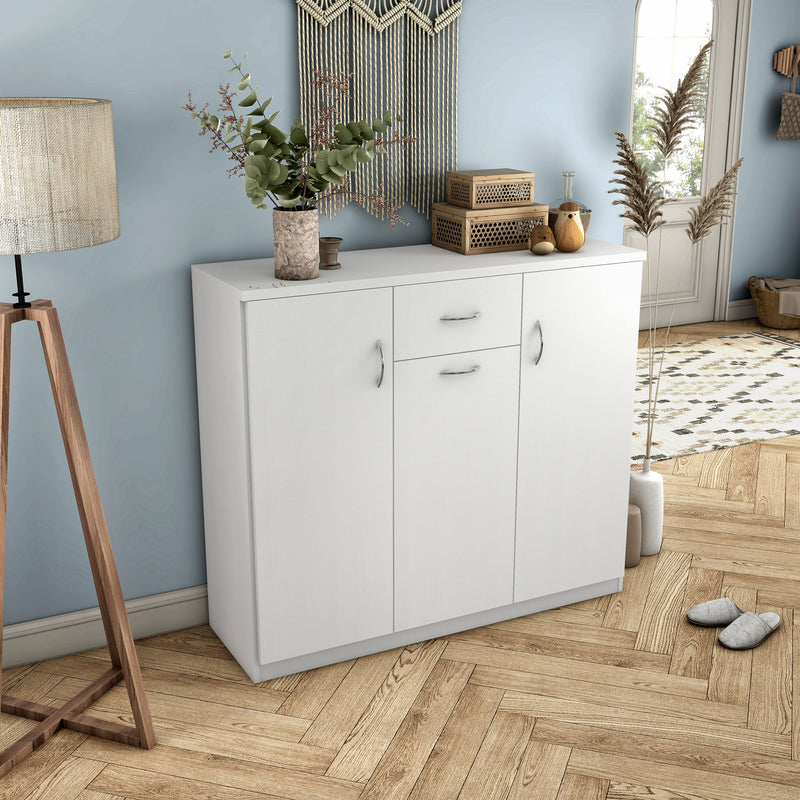 Right facing contemporary white three-door one-drawer shoe cabinet in a room with accessories