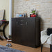 Left facing contemporary espresso three-door one-drawer shoe cabinet in a room with accessories