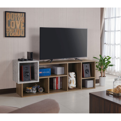 Right facing of a horizontal seven-shelf Industrial-style wood two-tone bookcase unit in a room with accessories