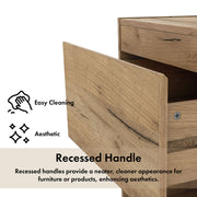 Informational image of the recessed handle on a rustic light oak one-drawer nightstand with an open shelf and a charging port in the tabletop