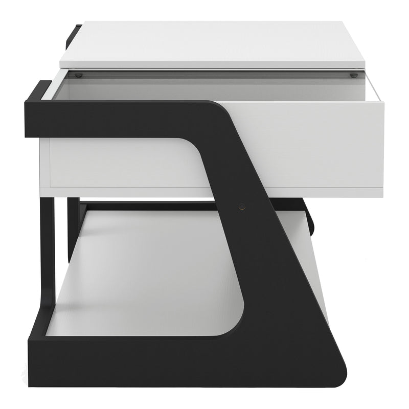 Front facing side view of a contemporary white and black storage coffee table with a half-width lift top on a white background