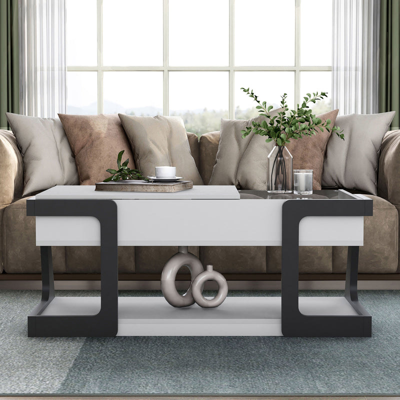 Front facing contemporary white and black storage coffee table with a half-width lift top in a room with accessories