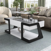 Left facing contemporary white and black storage coffee table with a half-width lift top in a room with accessories
