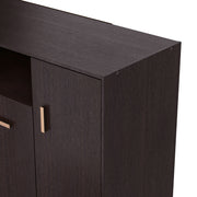 Left facing close up view of a contemporary espresso three-door one shelf shoe cabinet in a room with accessories