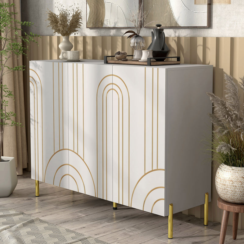 Left facing contemporary white three-door buffet with gold geometric accents in a room with accessories