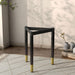 Right facing contemporary black three-legged triangle end table base (top not included) shown with a top on in a room with accessories