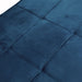 Tufted navy blue fabric.