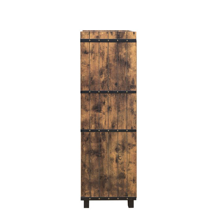 Left-facing distressed wood wine bar cabinet against a white background. The plank-style side panel is accented with studs for a rustic look.