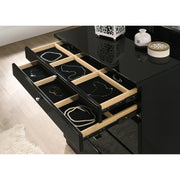 Detail shot of UV high gloss black vanity chest. Two felt-lined and compartmentalized drawers open on ball bearing glides to reveal jewelry organization.