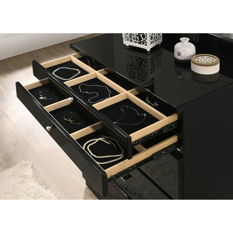 Detail shot of UV high gloss black vanity chest. Two felt-lined and compartmentalized drawers open on ball bearing glides to reveal jewelry organization.