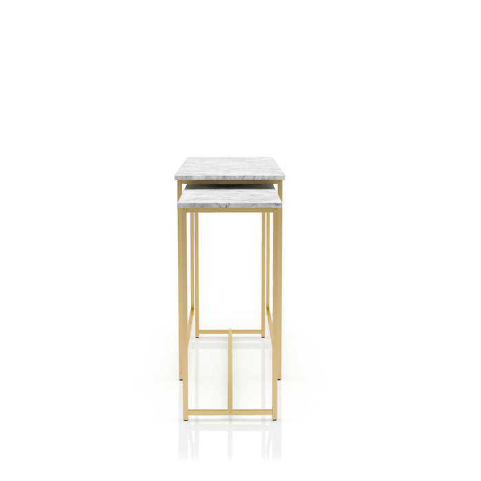 Side angle of faux white marble nesting tables with gold-tone frames on a white background.