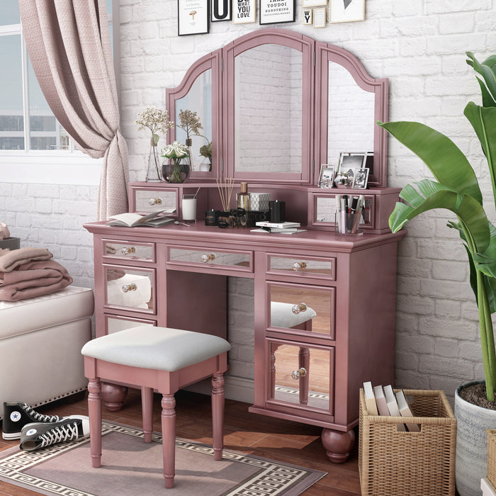 Left-angled rose gold vanity set in a youth bedroom. Make-up and journals adorn the vanity table.