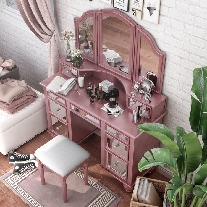 Top view of a rose gold vanity set in a youth bedroom. Make-up and journals adorn the vanity table.