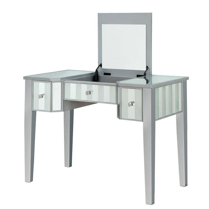 Left-angled silver vanity table against a white background. This vanity table features a lift-top with an underside mirror.