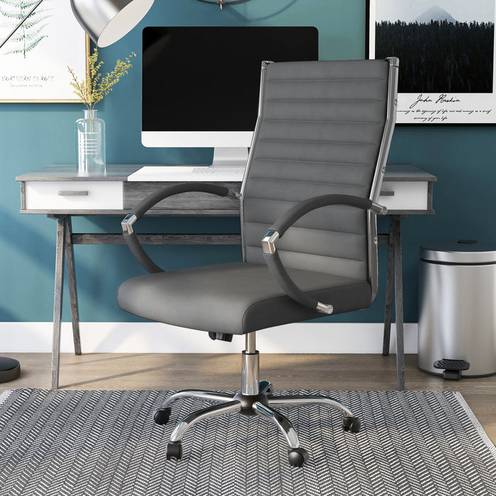 Left-angled grey swivel chair in a chic home office. The high square back has channel tufting.