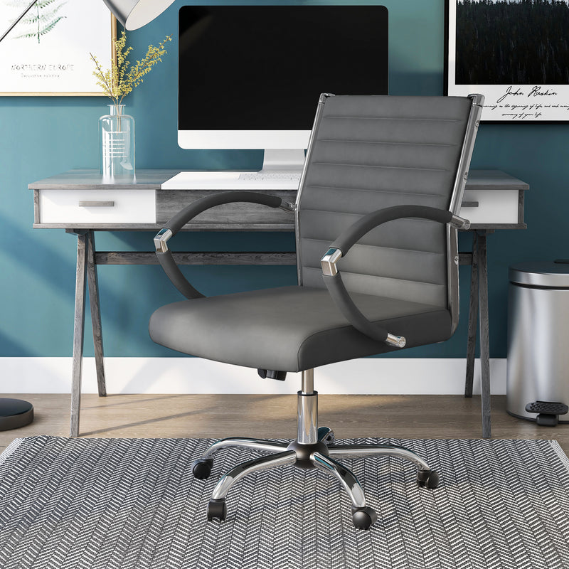 Left-angled grey swivel chair in a chic home office. The standard height square back has channel tufting.