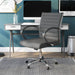 Left-angled grey swivel chair in a chic home office. The standard height square back has channel tufting.