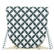 Detail shot of a pink patterned wicker bistro chair seat against a white background.