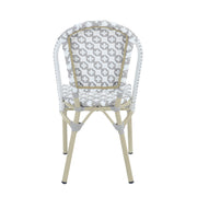 Backside of a grey and white octofoil pattern bistro chair back.