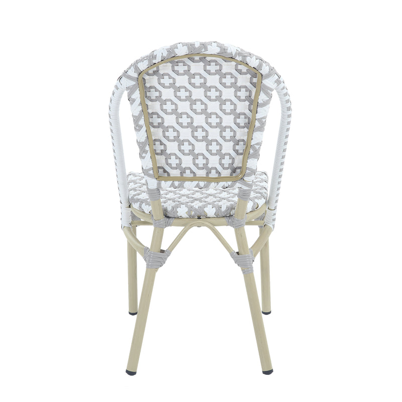 Backside of a grey and white octofoil pattern bistro chair back.