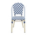 Front-facing navy and white octofoil pattern bistro chair against a white background. The seat edge is curved.