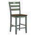 Antique green ladderback counter height chair against a white background.
