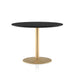 Gloss black round dining table with a bottom beveled edge on a gold disk base against a white background.