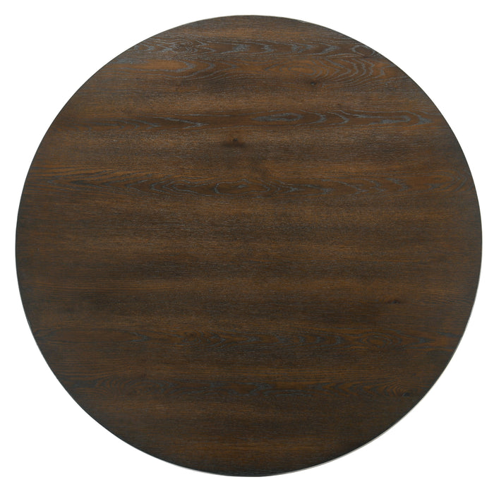 Top view of a dark walnut round dining table against a white background.