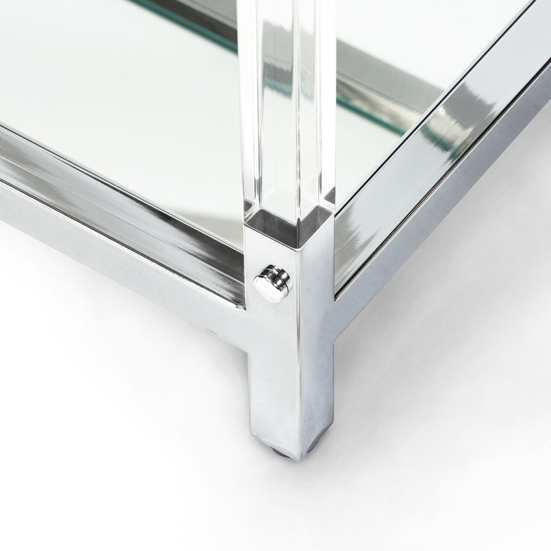 Left angled close-up view of mirror shelves in acrylic and chrome steel frame with rivets on modern sofa table on a white background