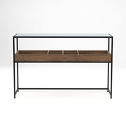 Straight-facing mixed material console table against a white background. A matte black steel frame holds a glass top for an open and airy design. Below the tabletop is a compartmentalized shelf. Two large compartments flank four smaller compartments in a warm wood color.
