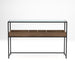 Straight-facing mixed material console table against a white background. A matte black steel frame holds a glass top for an open and airy design. Below the tabletop is a compartmentalized shelf. Two large compartments flank four smaller compartments in a warm wood color.