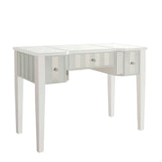 Right-angled white vanity table against a white background. This vanity table features a mirrored tabletop and stripe frosted mirrored drawers with acrylic knobs.