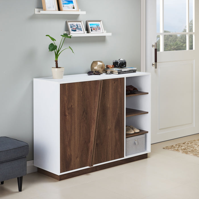 Right angled modern two-door shoe cabinet in white and brown in an entryway with accessories
