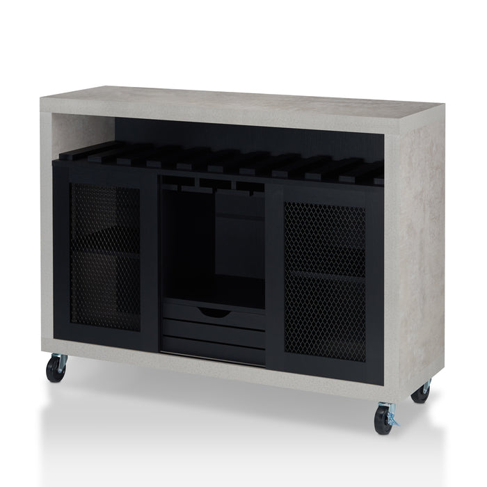 Left-angled cement and black wine bar cabinet against a white background. The 10 slots beneath the tabletop hold wine bottles, while the 3 stemware racks hang wine glasses. A plank-style drawer is flanked by wire-mesh cabinets. The entire buffet sits on wheels with parking brakes.
