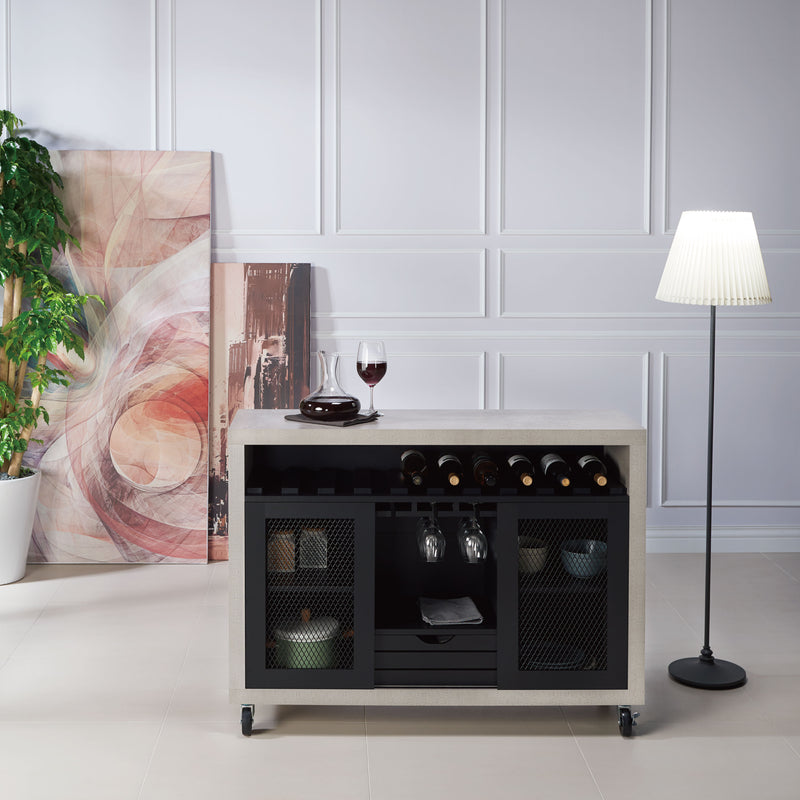 Straight-facing cement and black wine bar cabinet against a white background. The 10 slots beneath the tabletop hold wine bottles, while the 3 stemware racks hang wine glasses. A plank-style drawer is flanked by wire-mesh cabinets. The entire buffet sits on wheels with parking brakes.