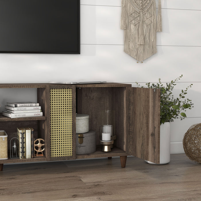 Right angled close up rustic three-shelf TV stand in reclaimed oak with door open in a living room with accessories