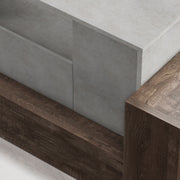 Left angled top view close up rustic faux concrete and reclaimed oak TV stand corner on a white background