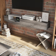Top view of a vintage grey oak wall-mounted TV console in a living room. A TV is mounted just above the console.