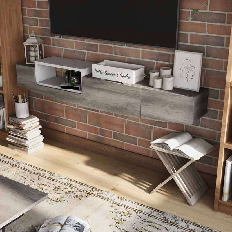 Top view of a vintage grey oak wall-mounted TV console in a living room. A TV is mounted just above the console.
