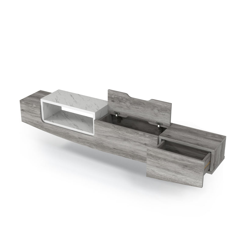 Left-angled vintage grey oak wall-mountable TV console against a white background. A lift-top storage compartment and open drawer reveal the consoles multi-functionality.