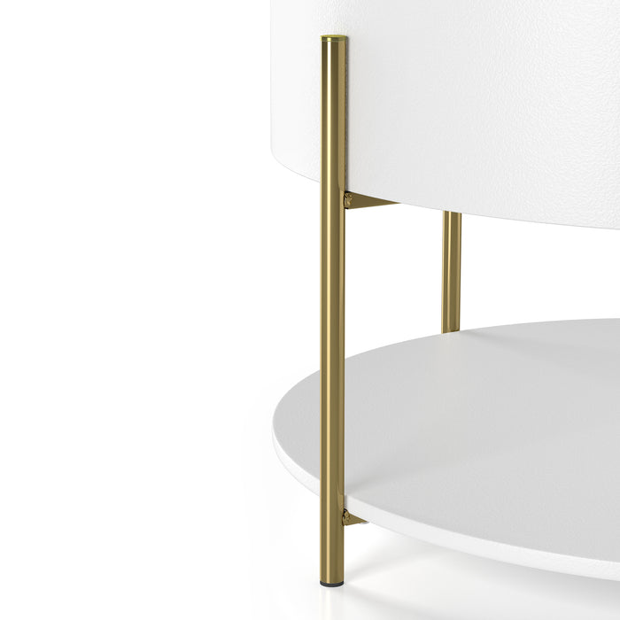 Front-facing close-up of gold finish iron legs on a modern round white storage coffee table with a sliding top on a white background