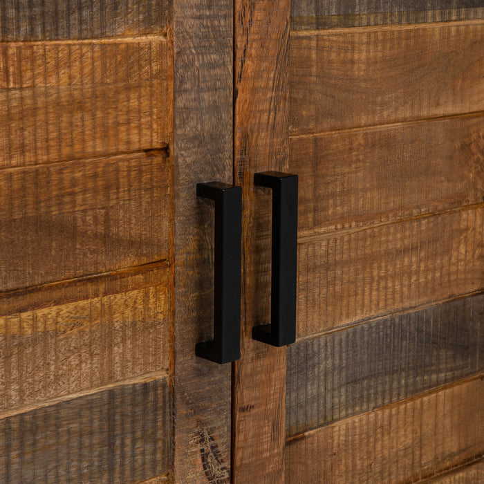 Detail shot of mango wood cabinets with plank-style panels and black bar pulls.