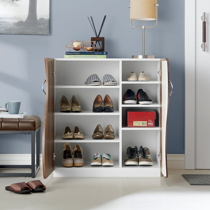 Front-facing view of contemporary white and distressed walnut shoe cabinet with open doors revealing shoes in foyer with accessories